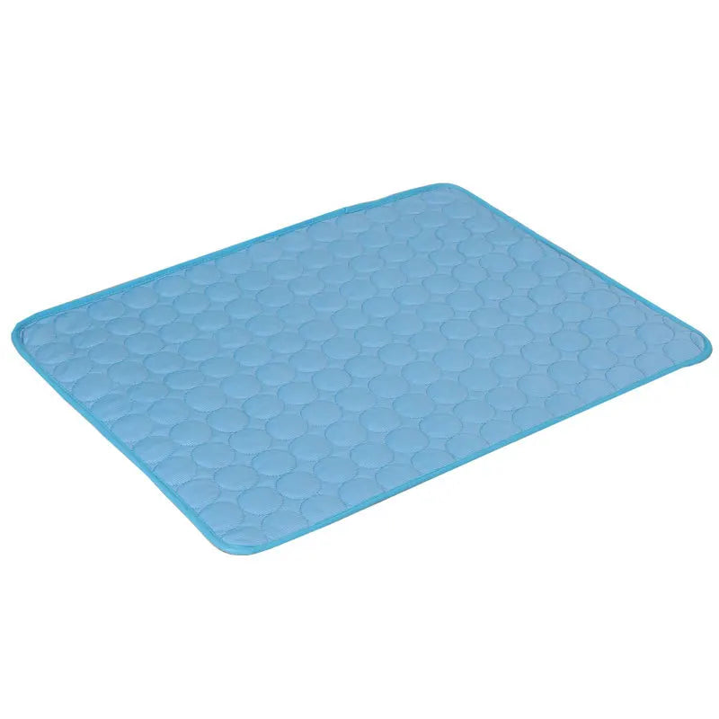 A light blue quilted cooling pad with a circular bubble pattern, shown on a plain white background.