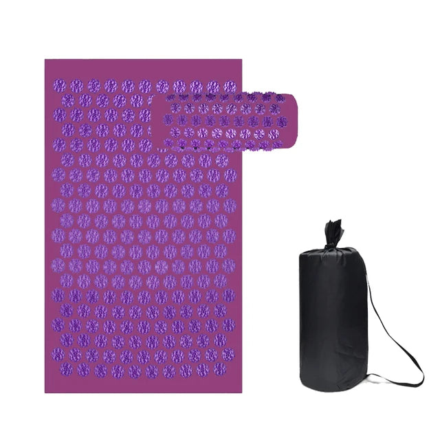 Purple acupressure mat with a black carrying bag on a white background