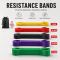 Set of resistance bands in various colors with weight labels on a white background