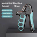Blue and black mechanical counting gripper on a gray background