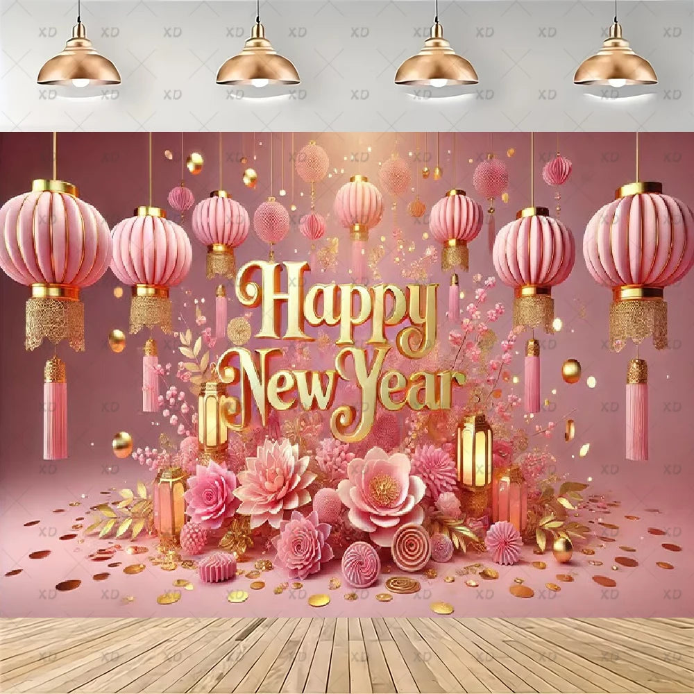 A festive New Year backdrop featuring pink hanging lanterns, gold decorative elements, large pink flowers, and the words 'Happy New Year' in gold lettering, set against a pink background with a wood floor visible at the bottom.