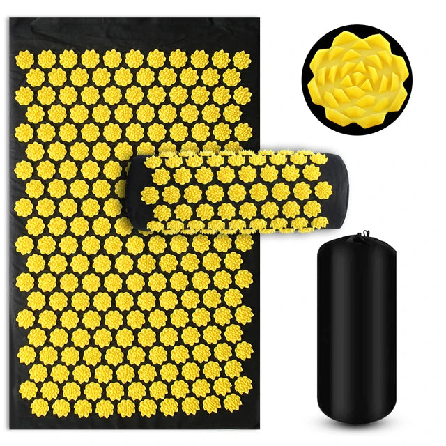 Acupressure mat with yellow flower-like nodes and black carrying case on a white background
