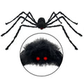 Halloween spider decoration with red eyes on a white background