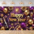 A festive New Year party backdrop featuring 'Happy New Year' in large gold letters over a purple background filled with gold balloons, champagne flutes, a champagne bottle, ornaments, stars, and confetti. The scene includes a gray upper wall with hanging pendant lights and a wooden floor at the bottom.