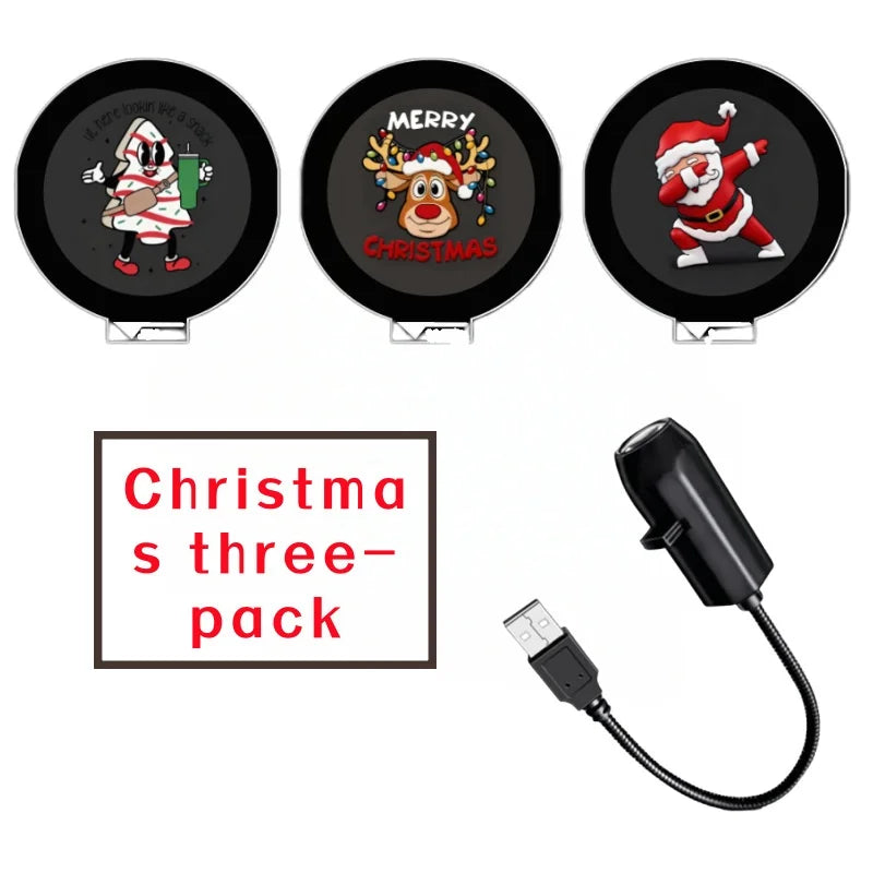 Three Christmas-themed phone stands with a USB cable on a white background.