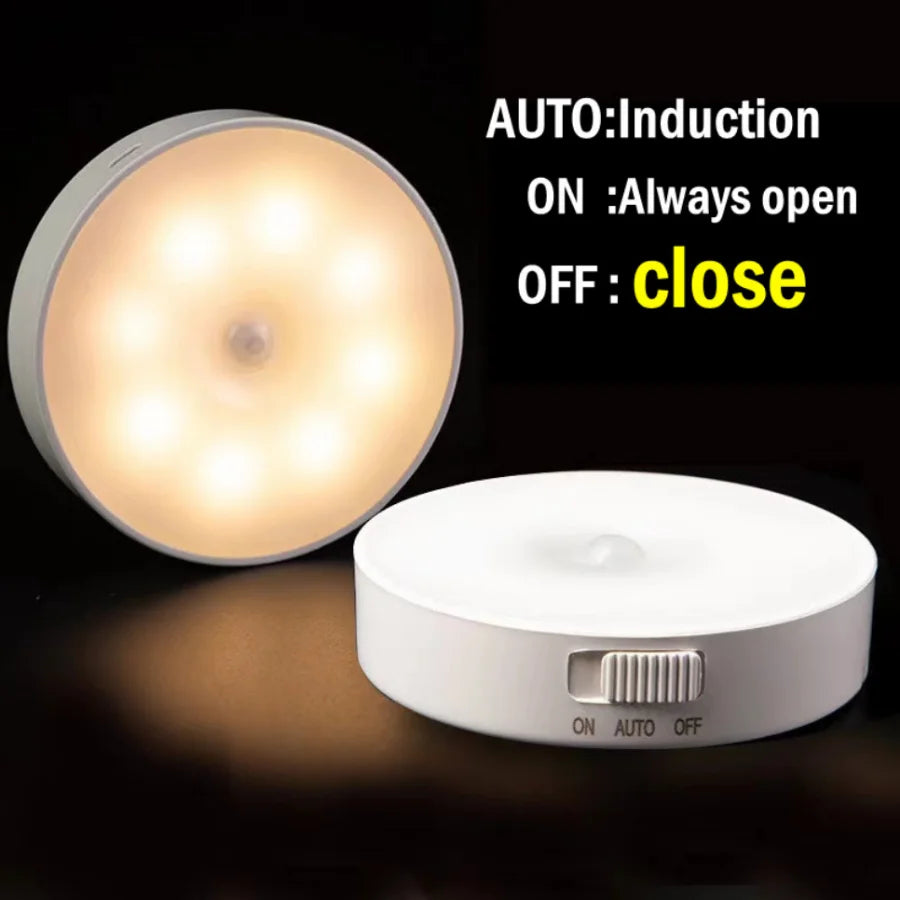 Induction light with control unit on a dark background