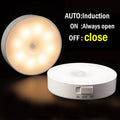 Induction light with control unit on a dark background
