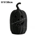 Black woven pumpkin-shaped basket with carved jack-o'-lantern face and a curled stem, shown on a white background with size text '11*11*20cm' in the top left.