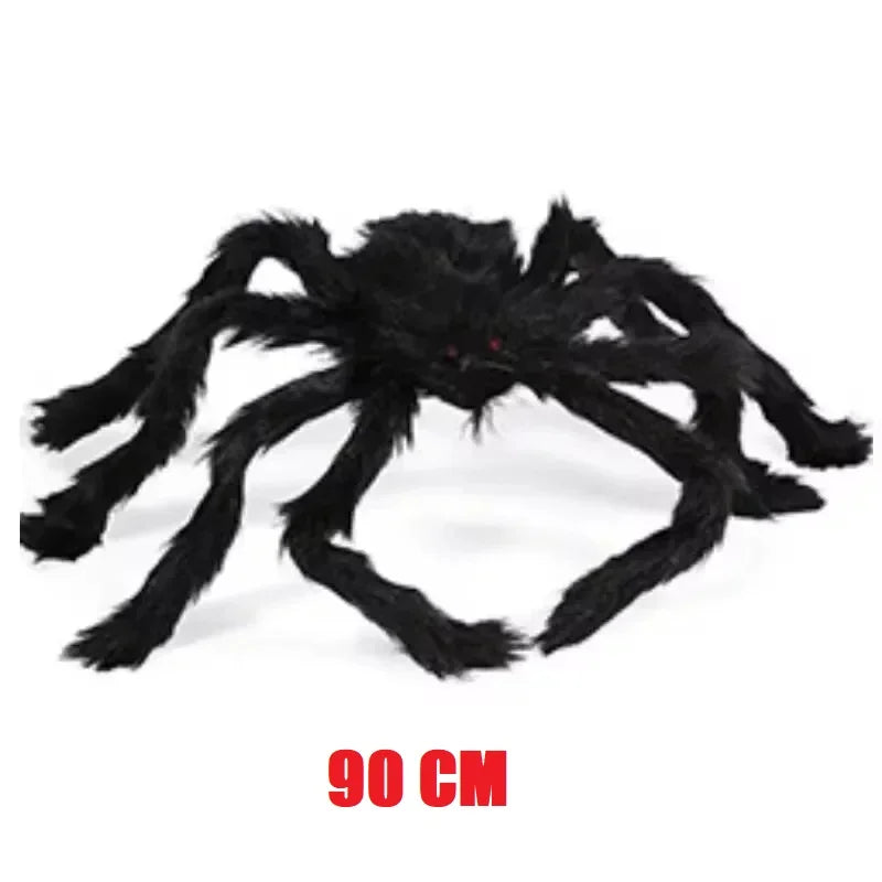 Large black spider toy with red eyes on a white background, labeled '90 CM'.