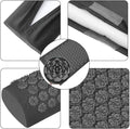 Collage of a black textured mat with close-up details on a white background