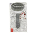 Pet grooming brush in packaging with brand logo on a white background