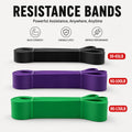 Three resistance bands in black, purple, and green with weight ranges on a white background.