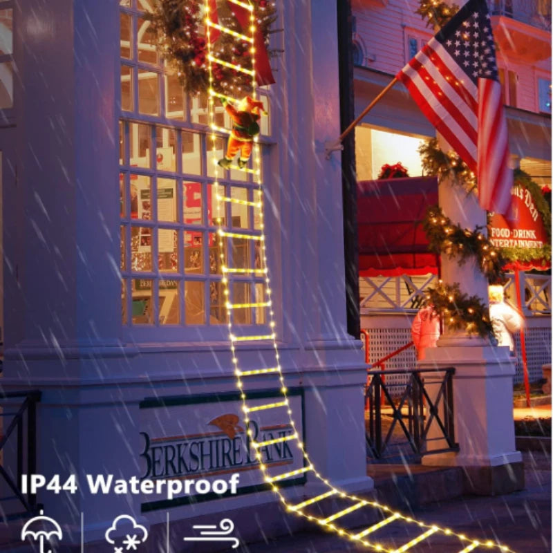 Decorative string lights on a building exterior with 'Berkshire Bank' branding.