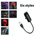 Black USB light with Halloween-themed images on a white background