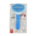 Blue pet grooming brush in packaging with cartoon character on a white background