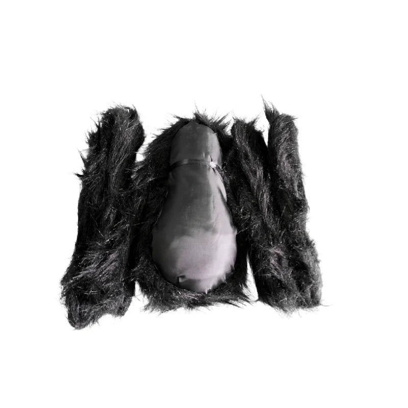 Black furry glove with a light bulb inside on a white background