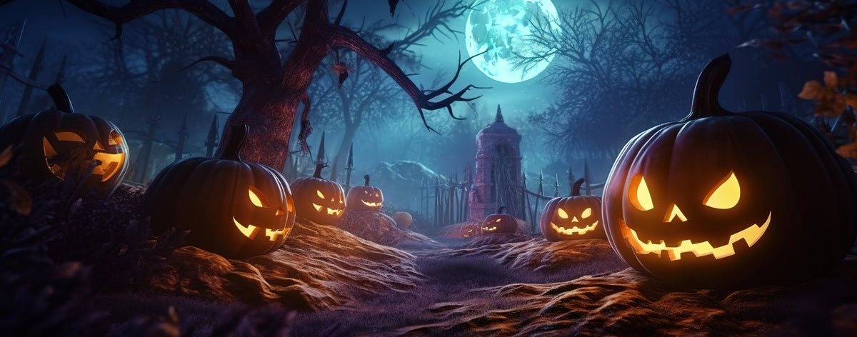 A spooky Halloween night scene with glowing jack-o'-lantern pumpkins placed along a dark path in a forest. Bare trees, a full moon, and a small haunted house are visible in the background.
